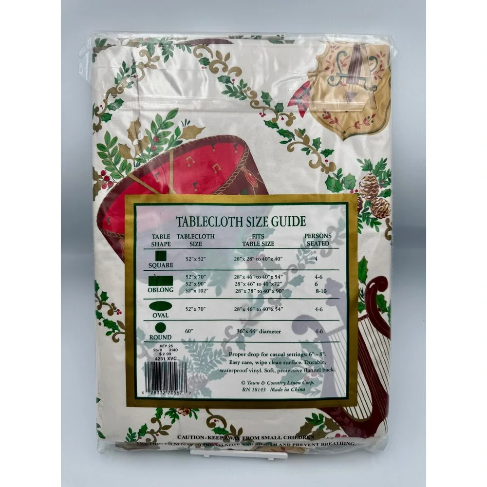VTG Town & Country Christmas Vinyl Tablecloth 52x90 Oblong Horn Holly Bow NOS